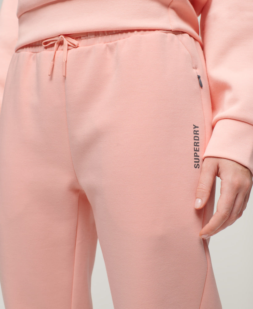 Sports Tech Slim Joggers | Peach Pearl Pink